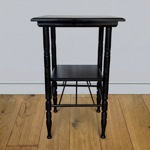 An ebonised occasional / lamp table from a design by E.W.Godwin circa 1890.
